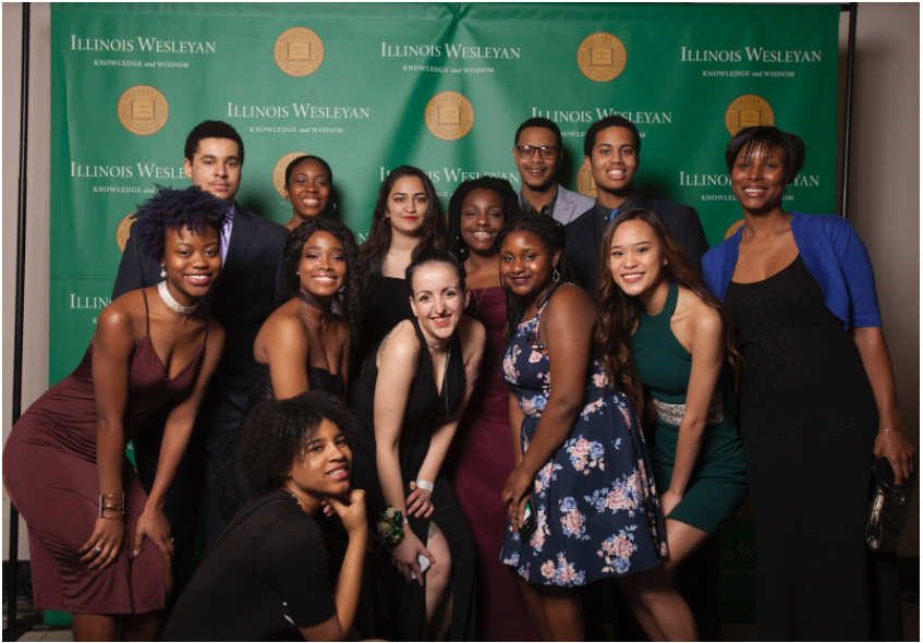 Hannah Mesouani (center) with a group of students at the 2018 Unity Gala. 
Photo: Illinois Wesleyan University
