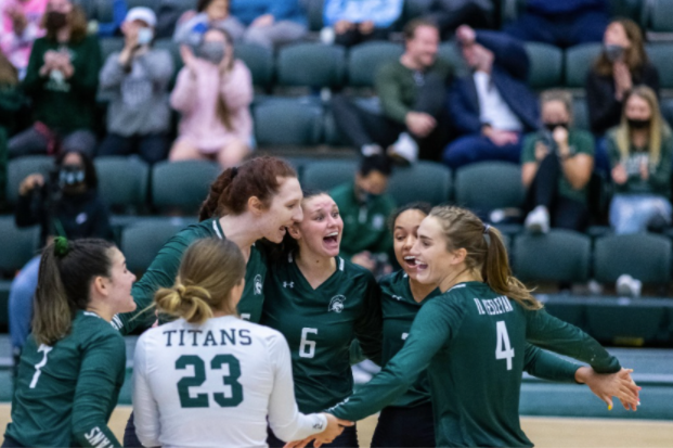 Senior CCIW Player of the Year Maddy Corey (#6) celebrates a three-set sweep against Carthage and the Championship title. Photo: Kodiak Creative