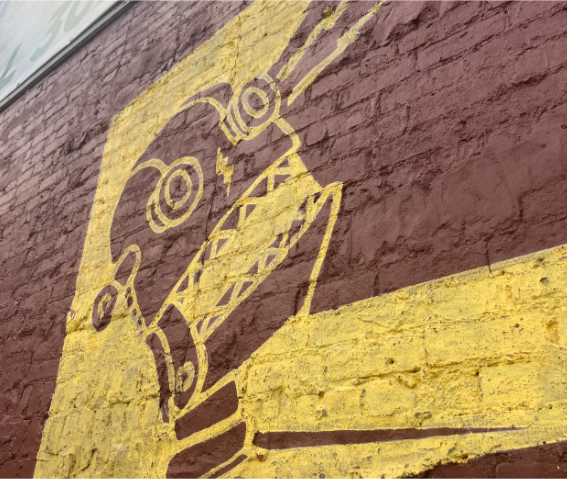 Bobzbay’s logo features a robot which appears both on the shop’s sign and as graffiti on the side of the building.
Credit: Liam Killian
